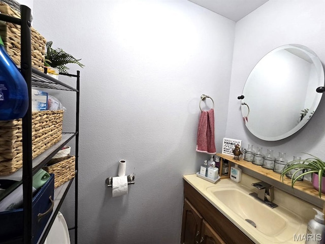 730 N Walnut St, Dexter, MO 63841 - bathroom with vanity and toilet