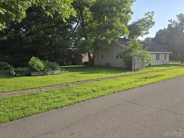 730 N Walnut St, Dexter, MO 63841 - view of front of home featuring a front lawn