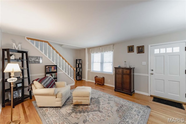 923 N Geyer Rd, Kirkwood, MO 63122 - living area with stairs and light wood-style flooring