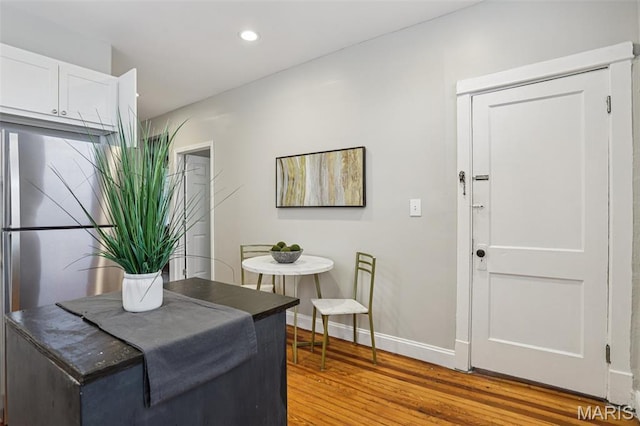 5532 Lansdowne Ave, Saint Louis, MO 63109 - dining room featuring light wood-type flooring and recessed lighting