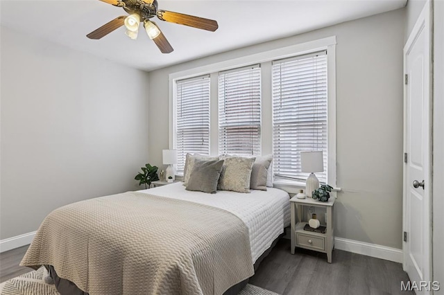 5532 Lansdowne Ave, Saint Louis, MO 63109 - bedroom featuring multiple windows, wood finished floors, and ceiling fan