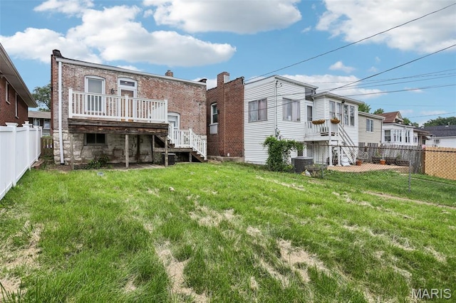 5532 Lansdowne Ave, Saint Louis, MO 63109 - rear view of house featuring stairway, a deck, a fenced backyard, and brick siding