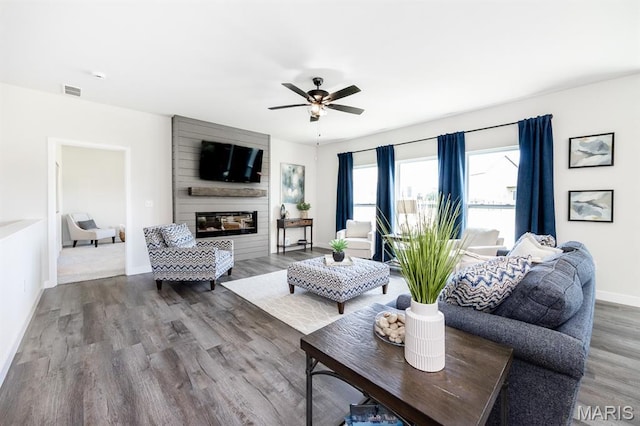 125 Chickasaw Ln, Ofallon, IL 62269 - living room with a ceiling fan, wood finished floors, and a fireplace