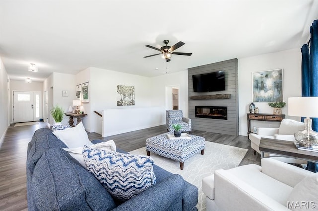 125 Chickasaw Ln, Ofallon, IL 62269 - living room featuring a ceiling fan, wood finished floors, and a fireplace