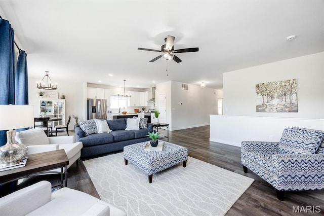 125 Chickasaw Ln, Ofallon, IL 62269 - living area with a chandelier, a ceiling fan, dark wood finished floors, and recessed lighting
