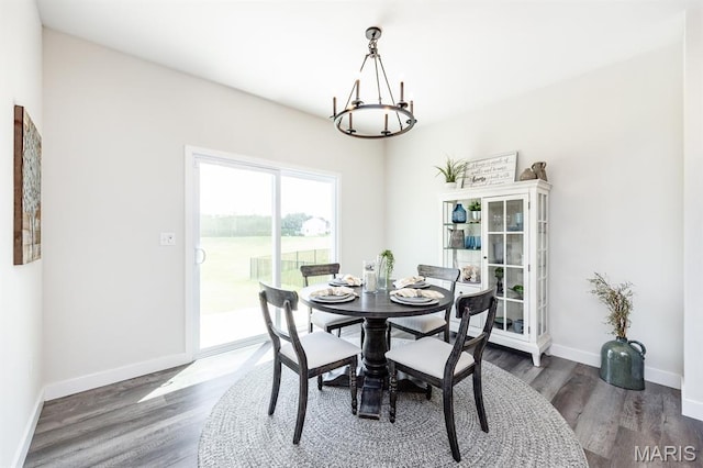 125 Chickasaw Ln, Ofallon, IL 62269 - dining space featuring a chandelier and wood finished floors