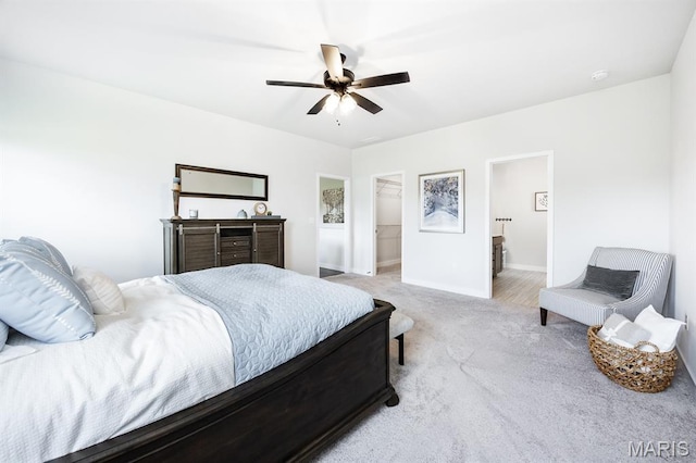 125 Chickasaw Ln, Ofallon, IL 62269 - bedroom featuring light carpet, a walk in closet, and a ceiling fan