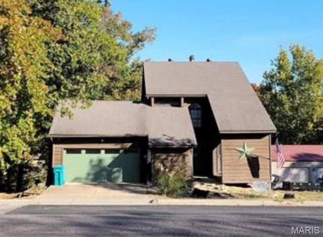 405 E Bittersweet Dr, Gerald, MO 63037 - view of front facade featuring concrete driveway and an attached garage