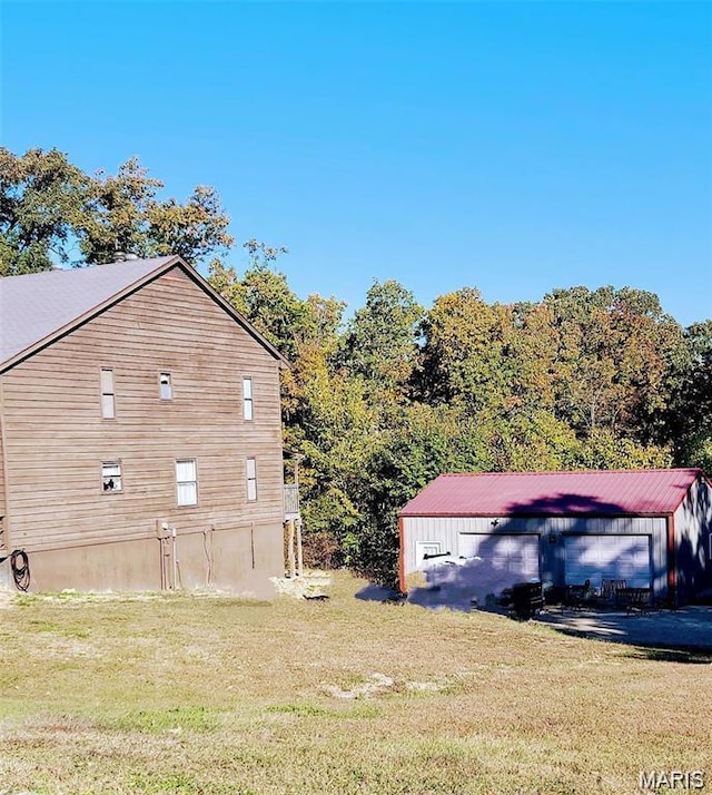 405 E Bittersweet Dr, Gerald, MO 63037 - view of side of property featuring a yard, an outbuilding, and a detached garage