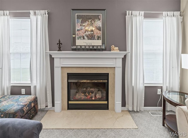 643 Titan Dr, Ofallon, IL 62269 - detailed view of carpet and a glass covered fireplace