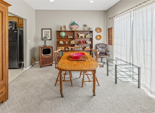 643 Titan Dr, Ofallon, IL 62269 - dining area with light colored carpet and recessed lighting