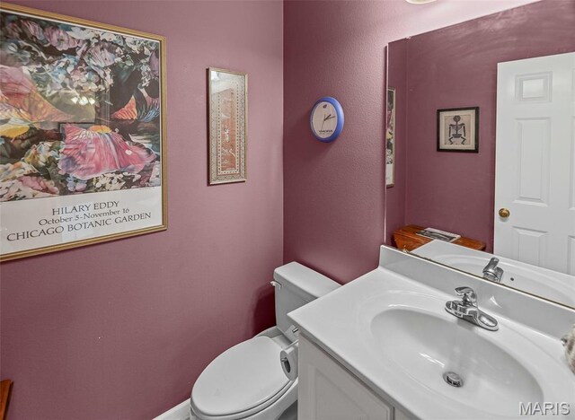 643 Titan Dr, Ofallon, IL 62269 - half bathroom with toilet and vanity