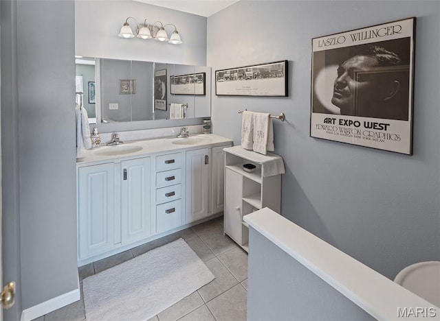 643 Titan Dr, Ofallon, IL 62269 - bathroom featuring double vanity and tile patterned flooring