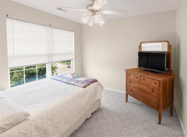 643 Titan Dr, Ofallon, IL 62269 - carpeted bedroom with baseboards and ceiling fan