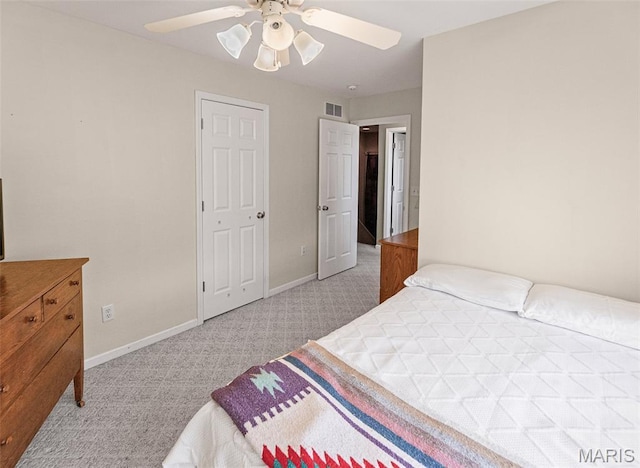 643 Titan Dr, Ofallon, IL 62269 - carpeted bedroom with baseboards and a ceiling fan