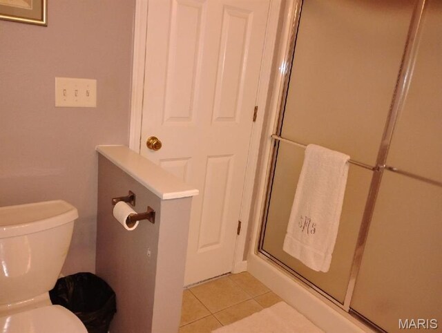 643 Titan Dr, Ofallon, IL 62269 - full bathroom with tile patterned floors and a stall shower