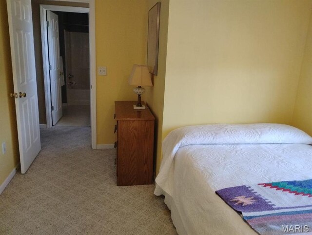 643 Titan Dr, Ofallon, IL 62269 - bedroom with light colored carpet and baseboards
