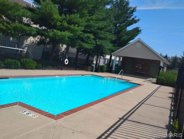 643 Titan Dr, Ofallon, IL 62269 - community pool featuring a patio