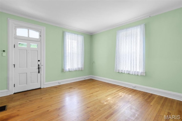 503 E State St, Union, MO 63084 - foyer featuring wood-type flooring and crown molding
