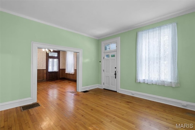 503 E State St, Union, MO 63084 - entrance foyer featuring ornamental molding, light wood-style flooring, and a chandelier