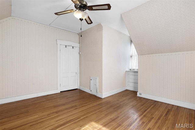 503 E State St, Union, MO 63084 - additional living space with attic access, ceiling fan, vaulted ceiling, and wood finished floors