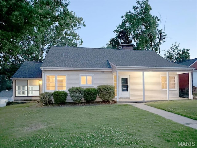 1001 Pike St, Saint Charles, MO 63301 - view of front of property featuring a front yard and a chimney