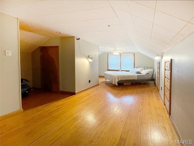 1001 Pike St, Saint Charles, MO 63301 - bedroom featuring light wood finished floors and lofted ceiling