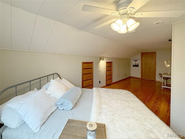 1001 Pike St, Saint Charles, MO 63301 - bedroom featuring wood finished floors, vaulted ceiling, and a ceiling fan