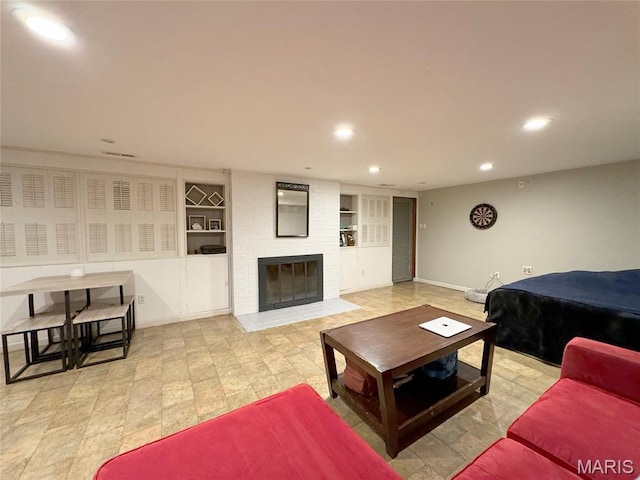 1001 Pike St, Saint Charles, MO 63301 - living area with recessed lighting, a brick fireplace, and built in features