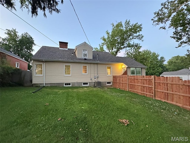 1001 Pike St, Saint Charles, MO 63301 - rear view of property featuring a chimney