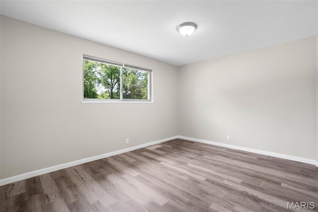 1715 Hudson Rd, Dellwood, MO 63136 - empty room with wood finished floors