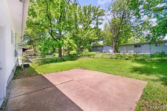 1715 Hudson Rd, Dellwood, MO 63136 - fenced backyard with a patio area
