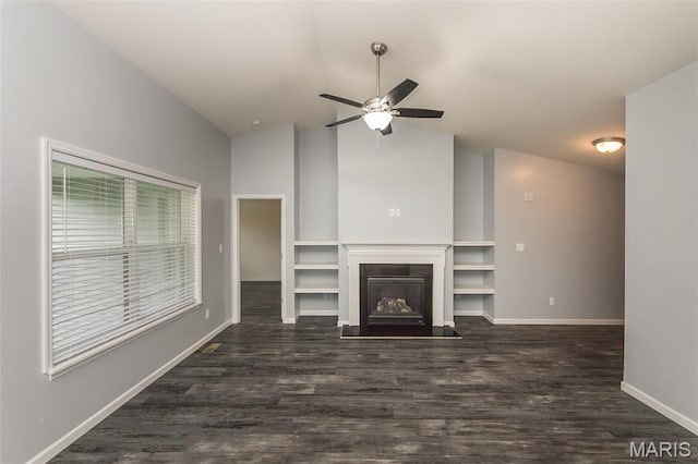 17458 Wyman Ridge Dr, Eureka, MO 63025 - unfurnished living room featuring a ceiling fan, wood finished floors, high vaulted ceiling, and a glass covered fireplace
