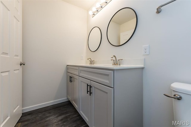 17458 Wyman Ridge Dr, Eureka, MO 63025 - bathroom with double vanity and wood finished floors