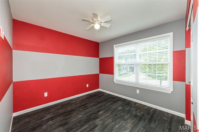 17458 Wyman Ridge Dr, Eureka, MO 63025 - empty room with wood finished floors and a ceiling fan