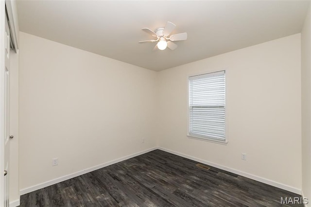 17458 Wyman Ridge Dr, Eureka, MO 63025 - empty room featuring dark wood finished floors and a ceiling fan