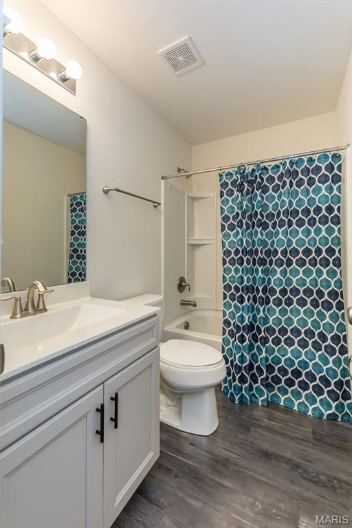 17458 Wyman Ridge Dr, Eureka, MO 63025 - full bathroom with vanity, wood finished floors, and shower / bath combo