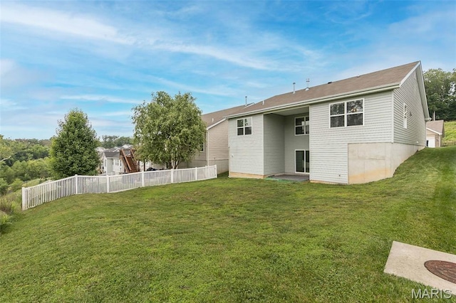 17458 Wyman Ridge Dr, Eureka, MO 63025 - back of house with a fenced backyard