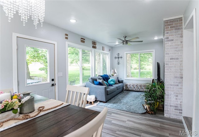 12310 State Route Hh, Rolla, MO 65401 - living room featuring wood finished floors, a ceiling fan, recessed lighting, and a chandelier