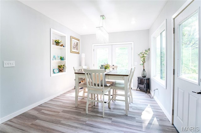 12310 State Route Hh, Rolla, MO 65401 - dining room featuring healthy amount of natural light, light wood-type flooring, and baseboards