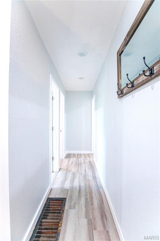12310 State Route Hh, Rolla, MO 65401 - corridor featuring light wood finished floors and baseboards