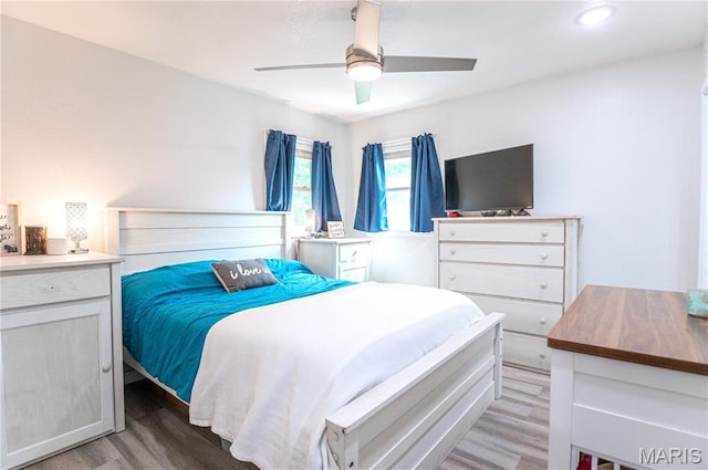 12310 State Route Hh, Rolla, MO 65401 - bedroom featuring light wood-style floors, ceiling fan, and recessed lighting