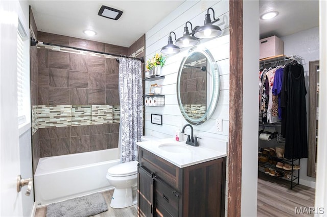 12310 State Route Hh, Rolla, MO 65401 - bathroom with vanity, shower / bath combo with shower curtain, toilet, and wood finished floors