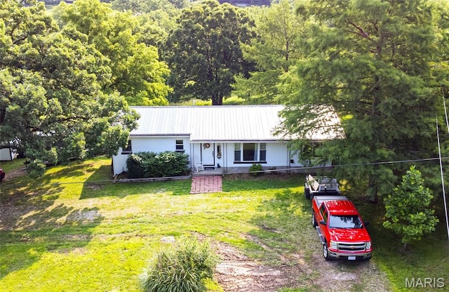 12310 State Route Hh, Rolla, MO 65401 - ranch-style house with a front lawn, metal roof, and a wooded view