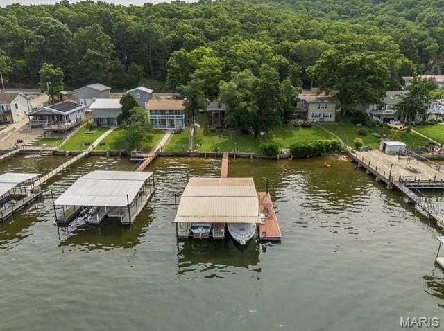 1527 Resorts Rd, Camdenton, MO 65020 - dock area featuring a water view and a forest view
