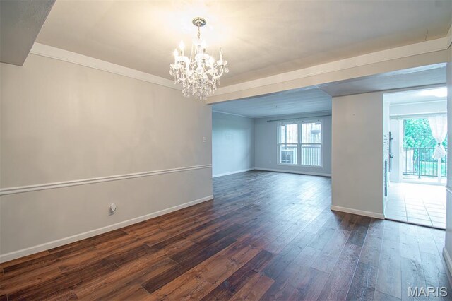 10344 Forest Brook Ln Unit C, Saint Louis, MO 63146 - unfurnished room with a chandelier, dark wood-style flooring, and crown molding