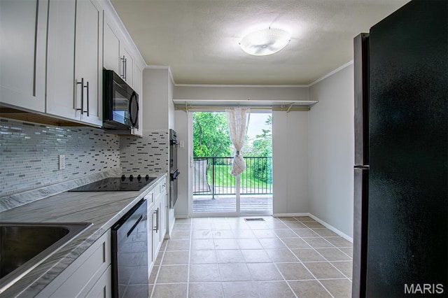 10344 Forest Brook Ln Unit C, Saint Louis, MO 63146 - kitchen featuring black appliances, decorative backsplash, crown molding, white cabinetry, and light tile patterned flooring