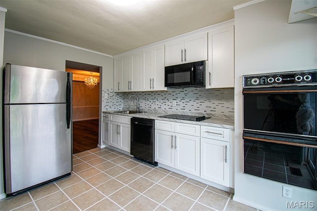 10344 Forest Brook Ln Unit C, Saint Louis, MO 63146 - kitchen featuring black appliances, white cabinetry, a chandelier, tasteful backsplash, and light tile patterned flooring