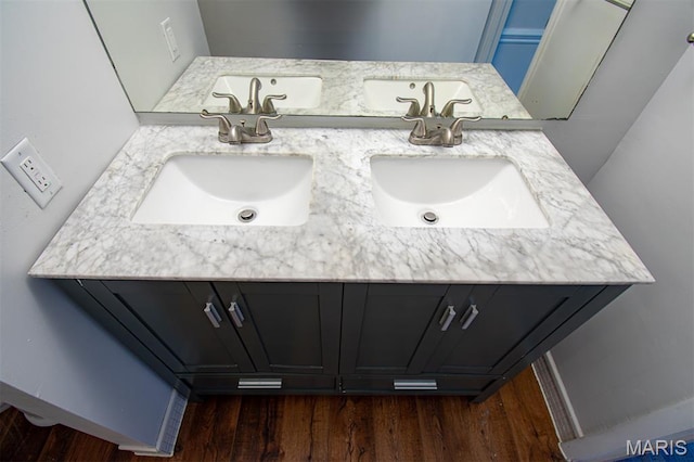 10344 Forest Brook Ln Unit C, Saint Louis, MO 63146 - bathroom featuring wood finished floors and double vanity