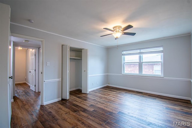 10344 Forest Brook Ln Unit C, Saint Louis, MO 63146 - unfurnished bedroom featuring dark wood finished floors, a closet, a ceiling fan, and crown molding